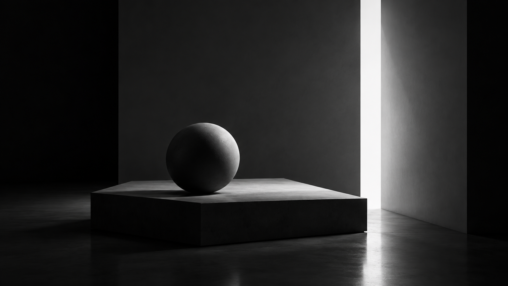 Sphere on a pedestal in a dark studio scene